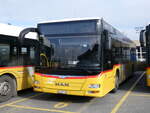 (269'515) - CarPostal Ouest - VD 606'576/PID 10'264 - MAN (ex TSPG Saignelgier) am 30. November 2024 in Yverdon, Garage