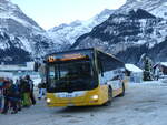 (270'408) - GrindelwaldBus, Grindelwald - Nr. 11/BE 261'865 - MAN/Gppel am 29. Dezember 2024 beim Bahnhof Grindelwald