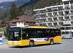 (273'257) - GrindelwaldBus, Grindelwald - Nr. 14/BE 202'568 - MAN/Göppel am 28. März 2025 beim Bahnhof Grindelwald