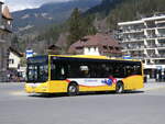 (273'258) - GrindelwaldBus, Grindelwald - Nr. 14/BE 202'568 - MAN/Göppel am 28. März 2025 beim Bahnhof Grindelwald