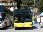 (290'827) - GrindelwaldBus, Grindelwald - Nr. 14/BE 202'568 - MAN/G�ppel am 11. September 2026 in Grindelwald, Gemeindehaus (prov. Bahnhof)