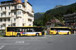 (289'447) - GrindelwaldBus, Grindelwald - Nr. 14/BE 202'568 - MAN/G�ppel + Nr. 30/BE 171'240 - Mercedes am 7. Juli 2026 beim Bahnhof Grindelwald