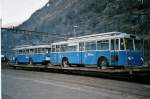 (051'323) - ACT Lugano (TVS) - Nr. 112 - FBW/Bosia Trolleybus + Nr. 126 - FBW/Hess Trolleybus (ex RhV Altsttten Nr. 6) am 1. Januar 2002 beim Bahnhof Biasca