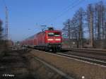 112 185-4 zieht den RE 18107 nach Eisenh�ttenstadt bei Briesen (Mark) 08.03.11