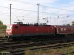 143 012-3 mit ein RB11 Cottbus und ein Fahrradbateilwagen im Zug beim verlassen von Eisenh�ttenstadt.