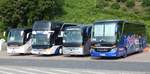 Setra 415 HD von Krautscheid und Setra 431 DT von Stewa und Setra 411 HD von Mundstock und Setra 516 HDH von Berr aus Deutschland im Stadthafen Sassnitz.
