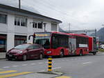 AFA Adelboden/865519/267706---afa-adelboden---be (267'706) - AFA Adelboden - BE 231'897 - Toyota + Nr. 28/BE 43'089 - Mercedes am 4. Oktober 2024 beim Bahnhof Frutigen