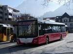 MAN/875777/272209---postauto-bern---be (272'209) - PostAuto Bern - BE 403'166/PID 12'336 - MAN (ex Dr. Richard, A-Wien Nr. 1411) am 17. Februar 2025 beim Bahnhof Interlaken West