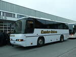 (244'533) - Kander-Reisen, Frutigen - Nr. 3/BE 52'682 - Neoplan (ex Autopostale, Croglio PID 3341) am 7. Januar 2023 beim Bahnhof Frutigen
