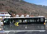 (258'991) - PostAuto Bern - BE 653'386/PID 12'065 - MAN am 29. Januar 2024 beim Bahnhof Interlaken Ost (Teilaufnahme)