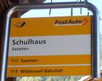 (290'624) - PostAuto-Haltestellenschild - Saxeten, Schulhaus - am 3.