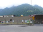 Linthal/752099/226789---glarner-buspostauto-haltestelle-am-25 (226'789) - Glarner Bus/PostAuto-Haltestelle am 25. Juli 2021 beim Bahnhof Linthal