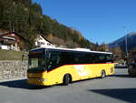 (230'038) - PostAuto Graubnden - GR 106'553 - Irisbus am 6. November 2021 beim Bahnhof Tiefencastel
