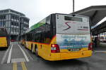 (284'606) - PostAuto Bern - BE 718'991/PID 10'526 - MAN am 3. Februar 2025 beim Bahnhof Stans