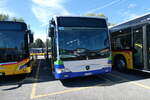 (289'505) - PostAuto Nordschweiz - BL 154'229/PID 12'420 - Mercedes (ex TPL Lugano Nr. 404) am 7. Juli 2026 in Yverdon, Garage